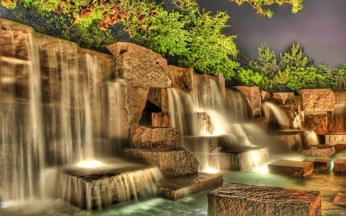 Serene Illuminated Waterfall and Garden Pond