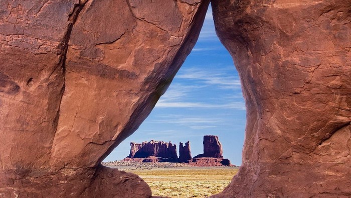 Monument Valley through a rock arch