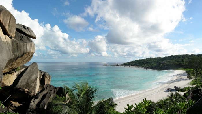 Tropical beach with granite boulders and turquoise water