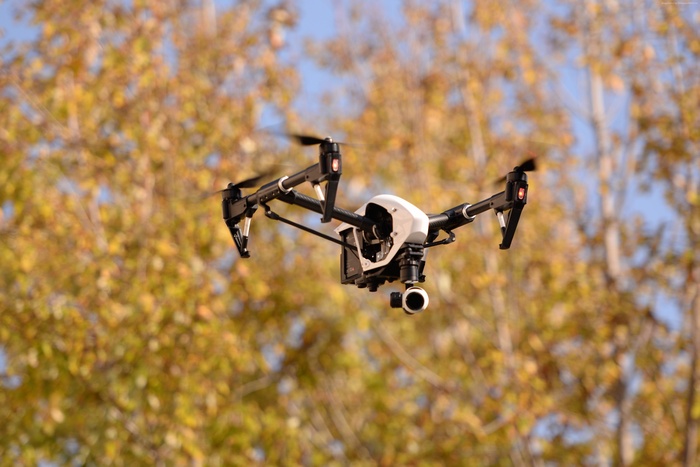 DJI Inspire One Drone Flying with Autumn Trees