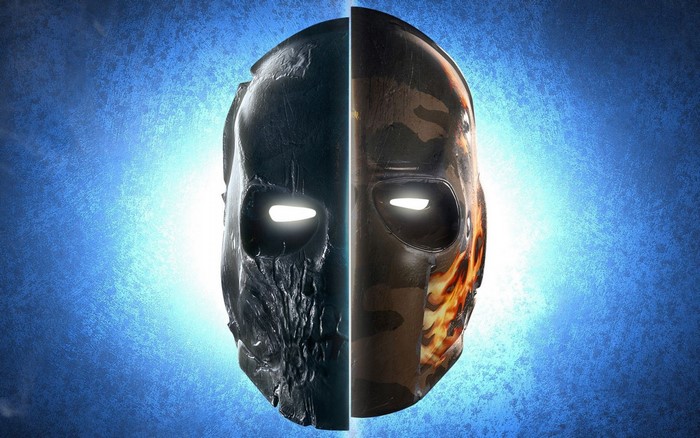 Split mask with glowing eyes on blue background