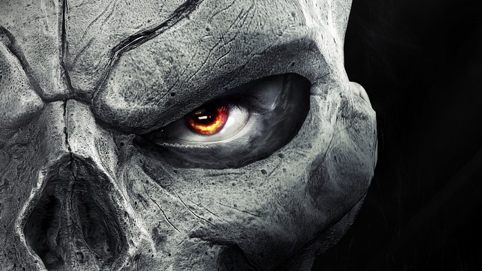 Close up of a skull with a glowing red eye