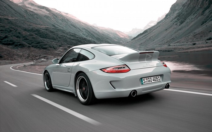 Porsche 911 Sport Classic driving on a mountain road
