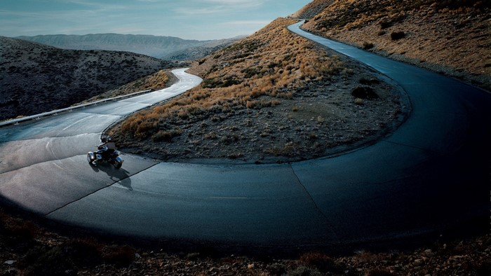 Motorcycle on a winding mountain road
