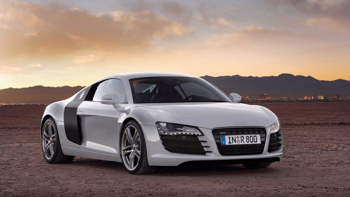 White Audi R8 sports car in desert landscape