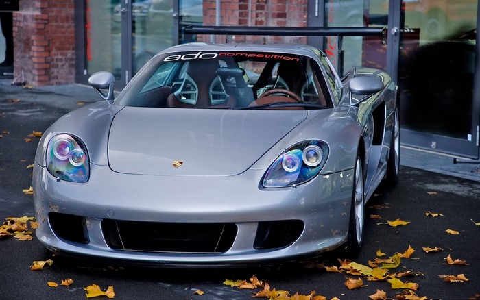 Silver Porsche Carrera GT with Edo Competition banner