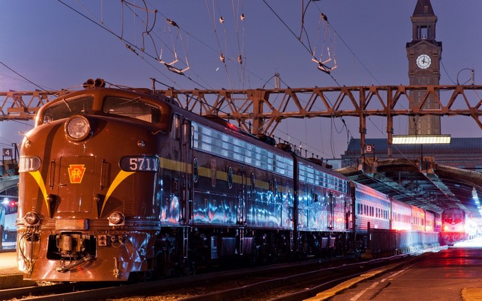 Pennsylvania Railroad train at night with clock tower
