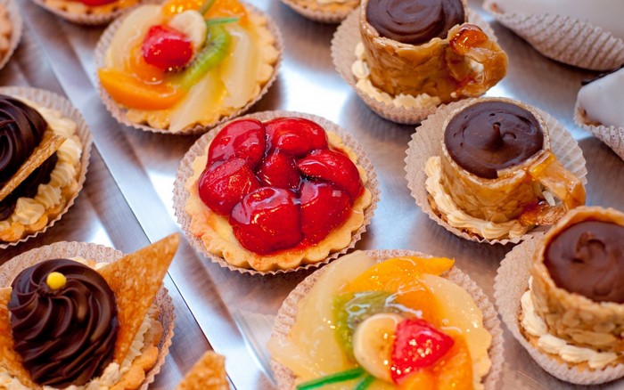 Assortment of fruit and chocolate tarts and pastries