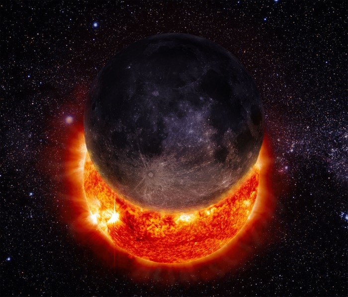 Solar eclipse with the Moon and Sun in space
