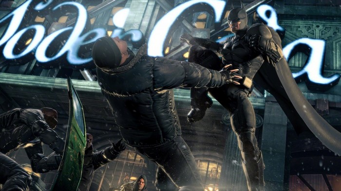 Batman from Batman Arkham Origins fighting thugs