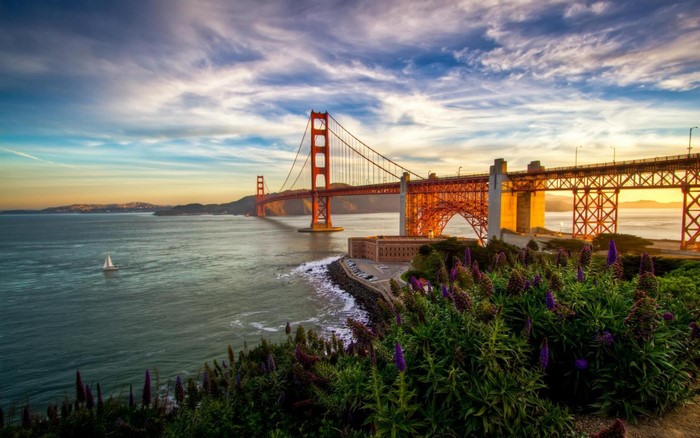 Golden Gate Bridge at sunset over the bay
