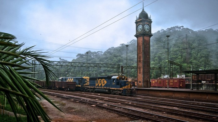 Train station with clock tower and train in Brazil