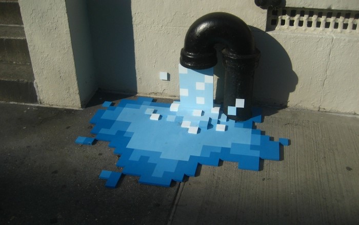 Pixelated water flowing from a pipe onto the street