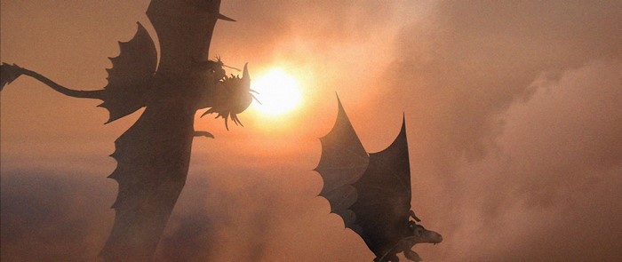 Dragons flying in front of the sun in How to Train Your Dragon 2