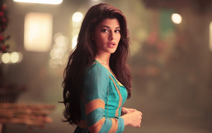 Jacqueline Fernandez in a blue and orange dress