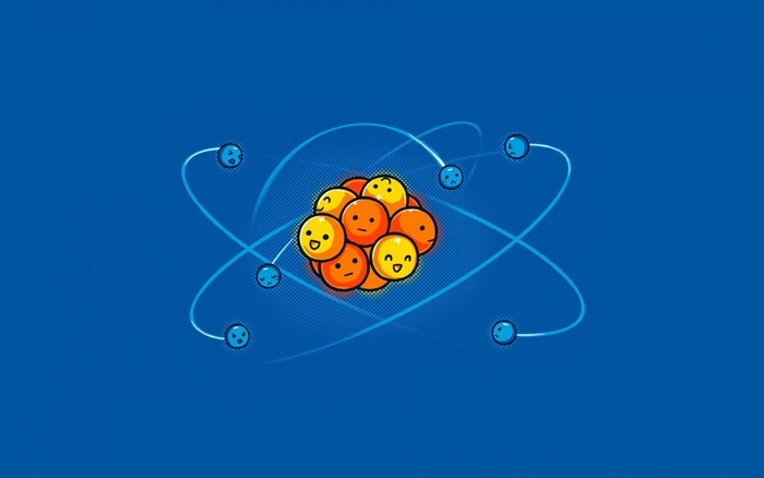 Cartoon atom with smiley faces