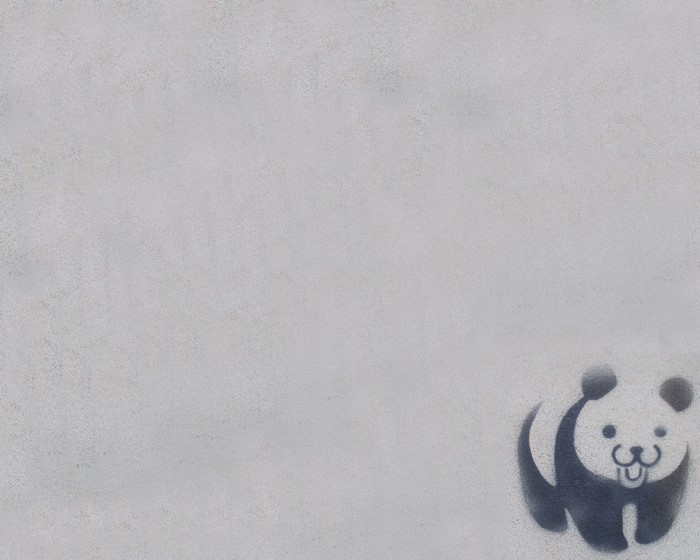 Simple panda drawing on a textured surface