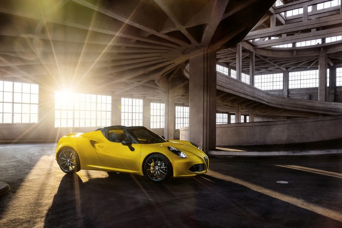 Yellow Alfa Romeo 4C Spider in a Parking Garage