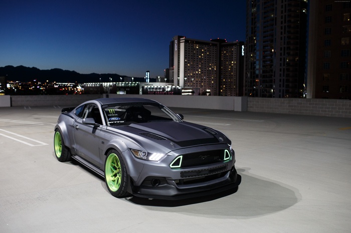 Ford Mustang RTR sports car on a rooftop parking lot at night