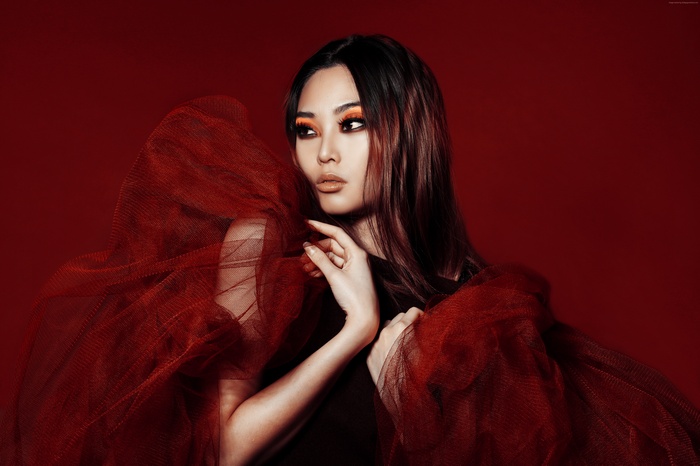 Model Lucy Creber with red tulle