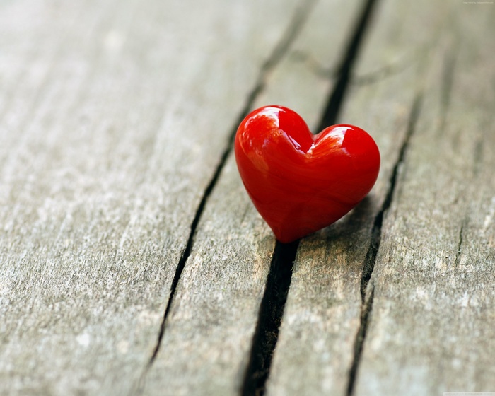 Red Heart on Wooden Surface
