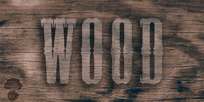 The word WOOD on a wooden texture background