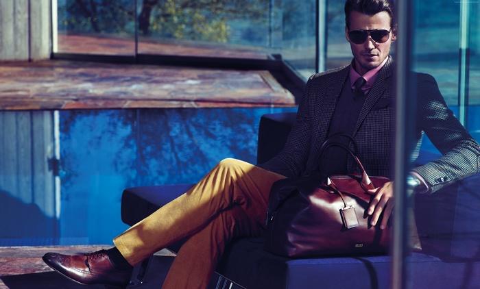Alex Lundqvist wearing a suit and sunglasses