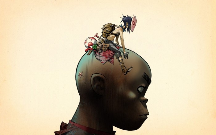 Noodle from Gorillaz sitting on Russel Hobbs' head