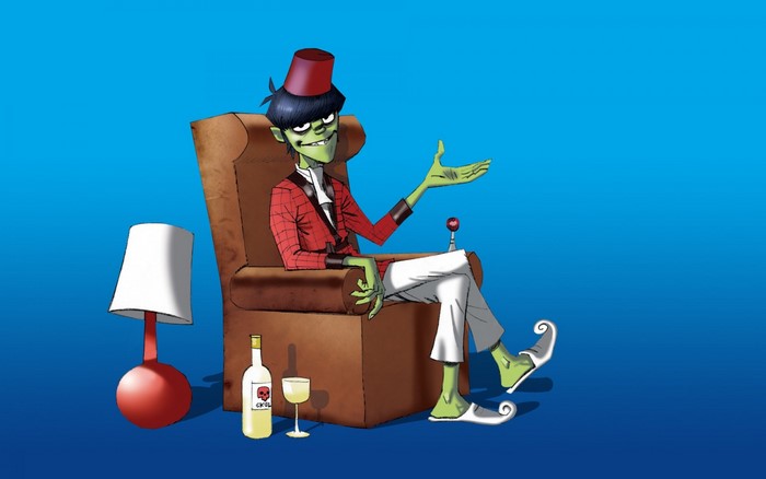 Murdoc Niccals from Gorillaz sitting in a chair