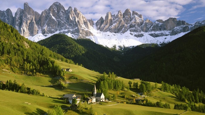 Village in the Alps with Snow-Capped Mountains