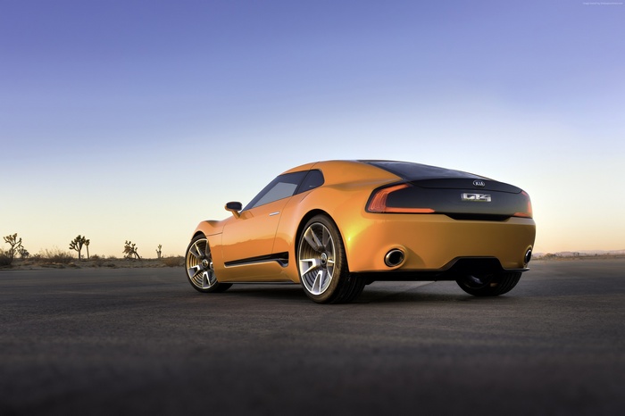 Kia GT4 Stinger sports car in desert landscape