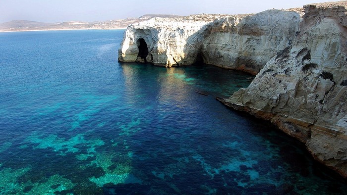 Sea caves in white cliffs along the coast
