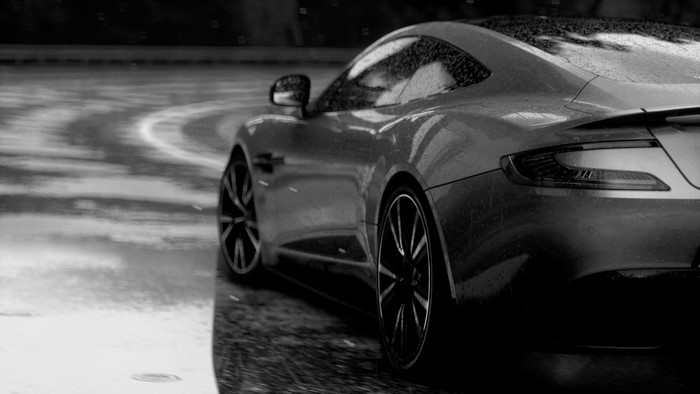 Aston Martin Vanquish on a wet road