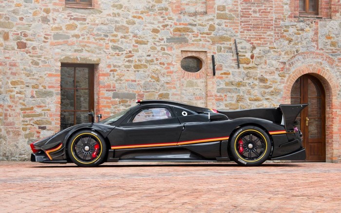 Pagani Zonda Revolucion parked in front of stone building