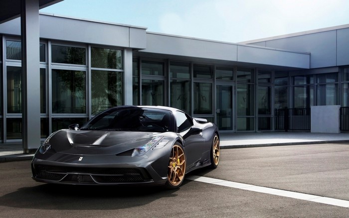 Ferrari 458 Speciale parked in front of a modern building