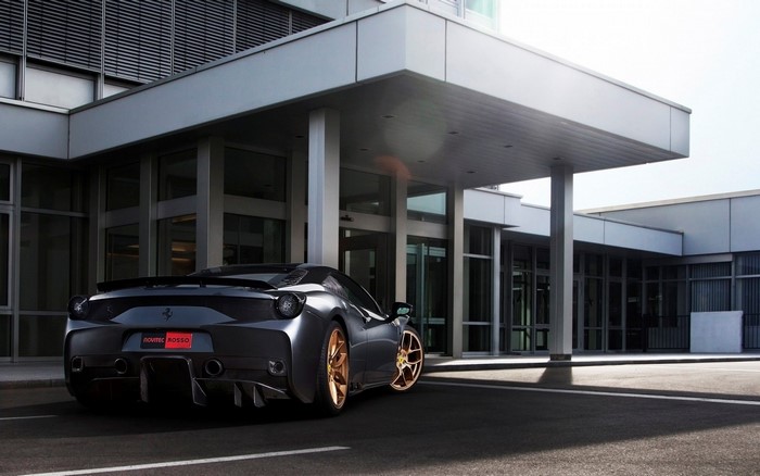 Novitec Rosso Ferrari 458 Speciale parked outside building