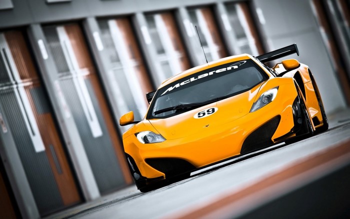 Orange McLaren MP4 12C GT3 race car with number 59