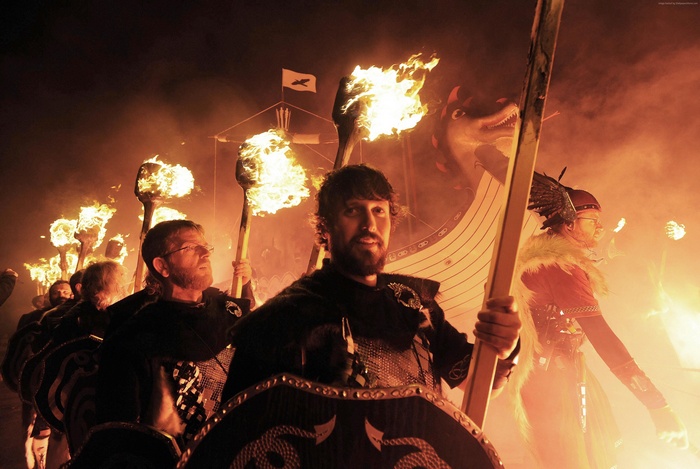 Vikings with torches at Up-Helly-Aa festival