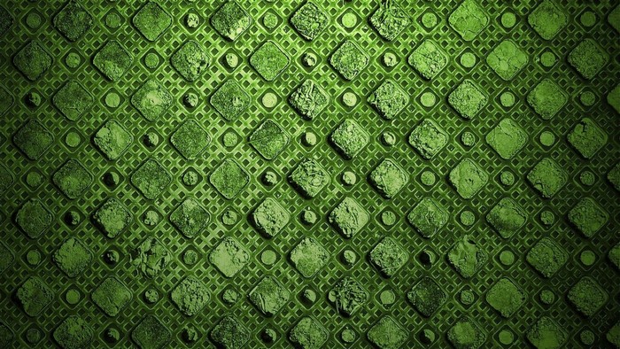 Green textured abstract pattern with squares and circles