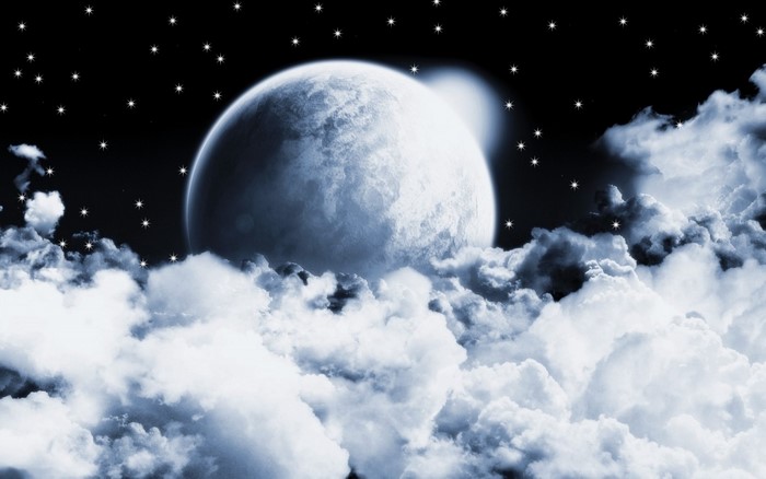 Full moon and clouds in the night sky