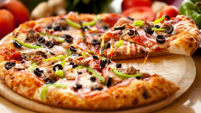 Delicious Italian Pepperoni and Veggie Pizza Slice