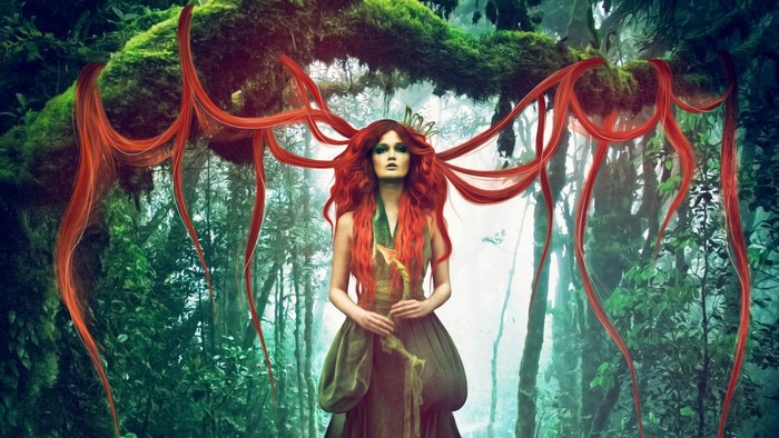 Fantasy art of a woman with red hair in a jungle