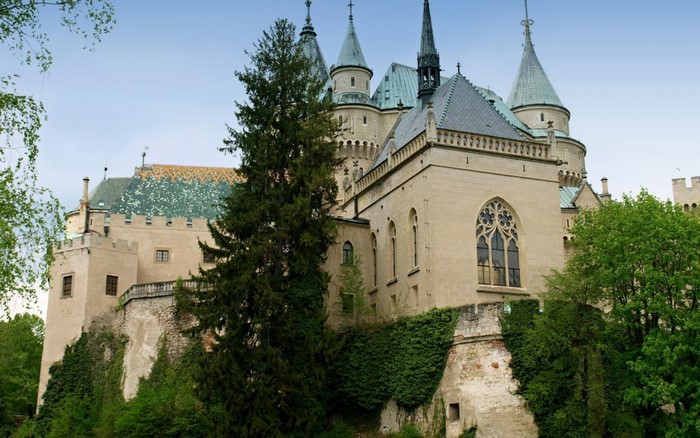 Bojnice Castle in Slovakia with trees and sky