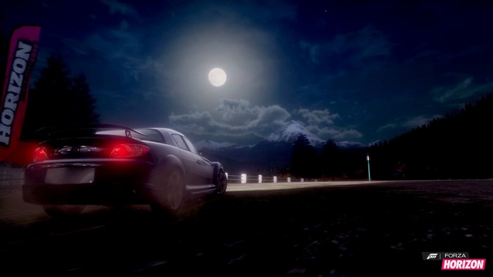 Sports car driving on a road at night in Forza Horizon