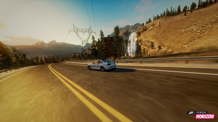 White BMW M3 driving on a mountain road in Forza Horizon