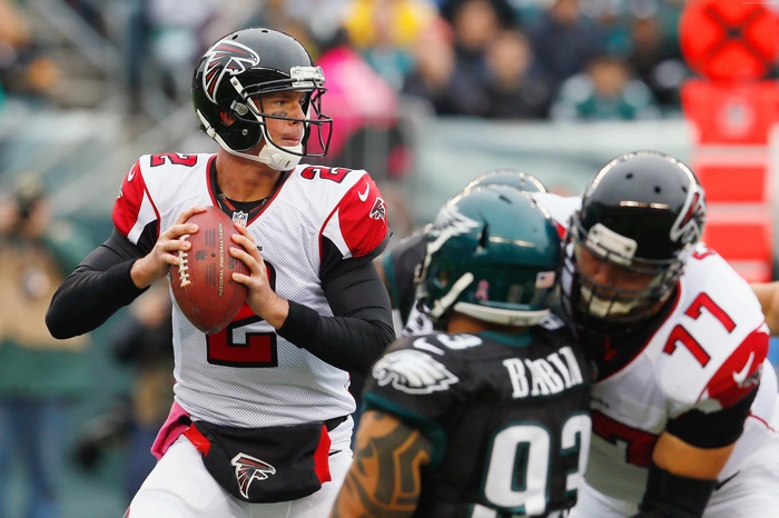 Matt Ryan of the Atlanta Falcons with opponents