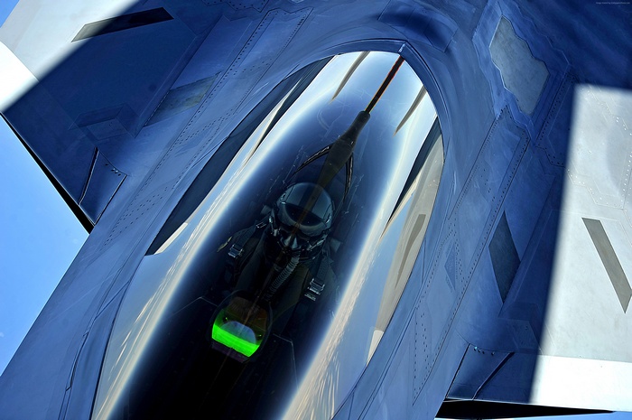 Pilot in Lockheed Martin F-22 Raptor cockpit