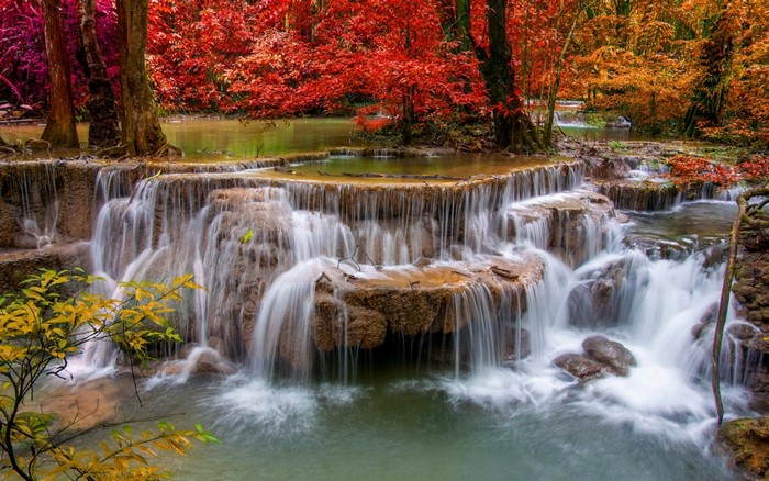 Waterfall in a colorful autumn forest