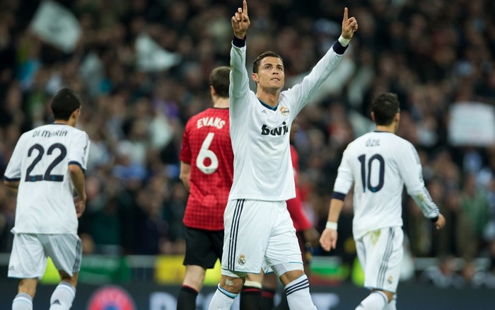 Cristiano Ronaldo and teammates celebrating on the field