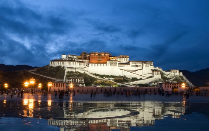 Potala Palace at dusk with reflection in water